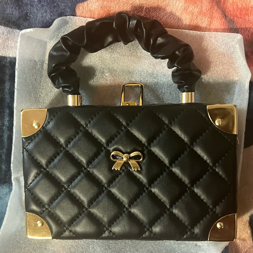 Black and gold purse